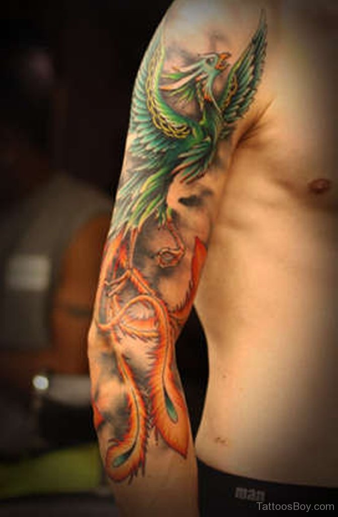 Awesome Colorful Phoenix Tattoo On Man Right Full Arm