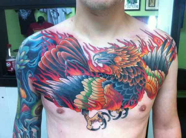 Awesome Colorful Phoenix Tattoo On Man Chest