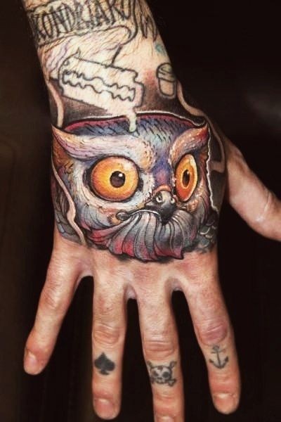 Awesome Owl Head Tattoo On Right Hand