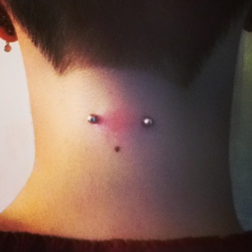 Awesome Silver Barbell Back Neck Piercing