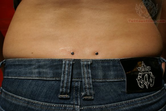 Back Dimple Piercing With Dermals