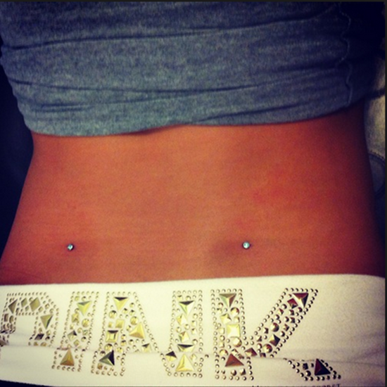 Back Dimple Piercing With Microdermals