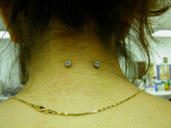 Back Neck Piercing With Dermal Anchors