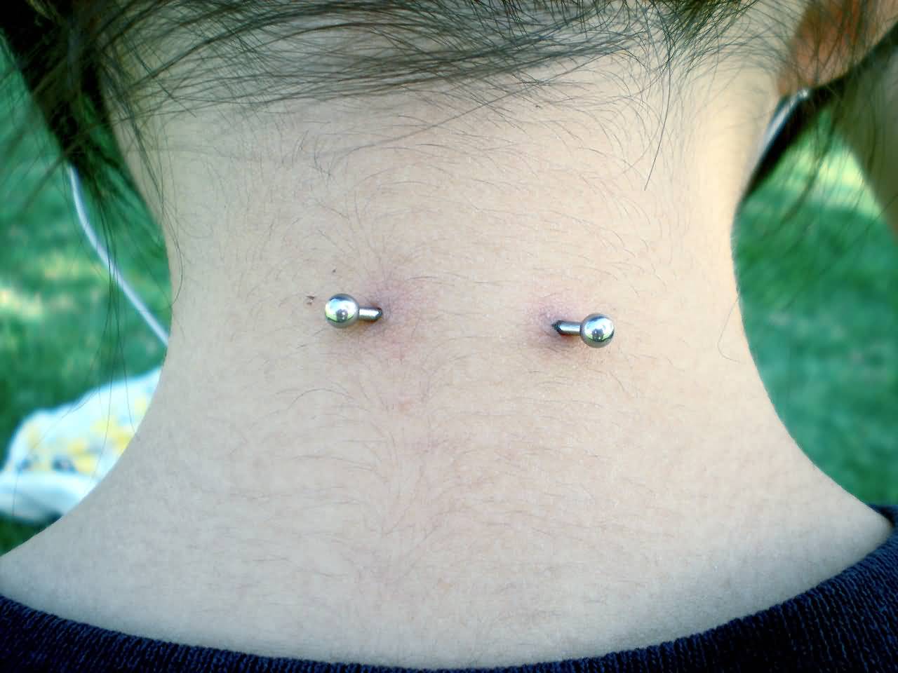 Beautiful Back Neck Piercing With Silver Barbell
