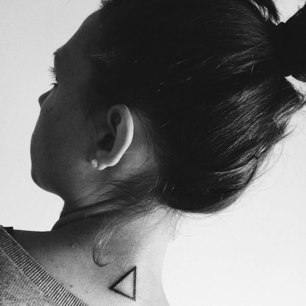 Beautiful Black Outline Triangle Tattoo On Girl Back Neck