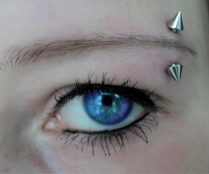 Beautiful Eyebrow Piercing With Spike Barbell