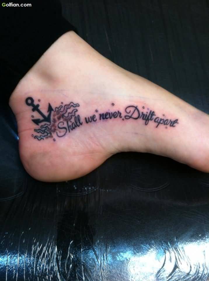 Black Anchor And Shall We Never Drift Apart Foot Quote Tattoo