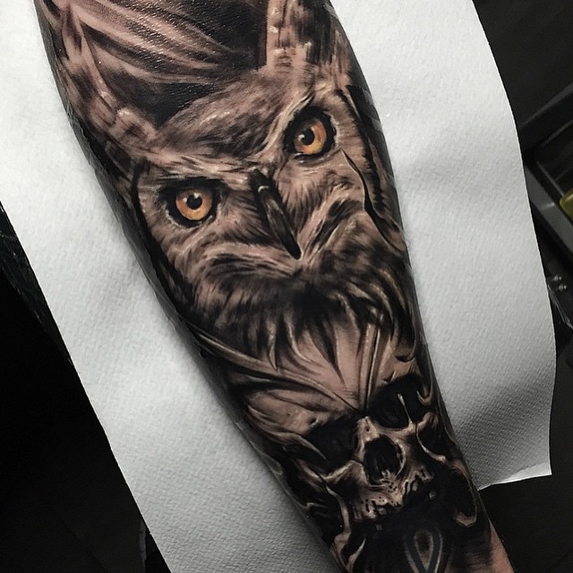 Black And Grey 3D Owl Face Tattoo On Forearm