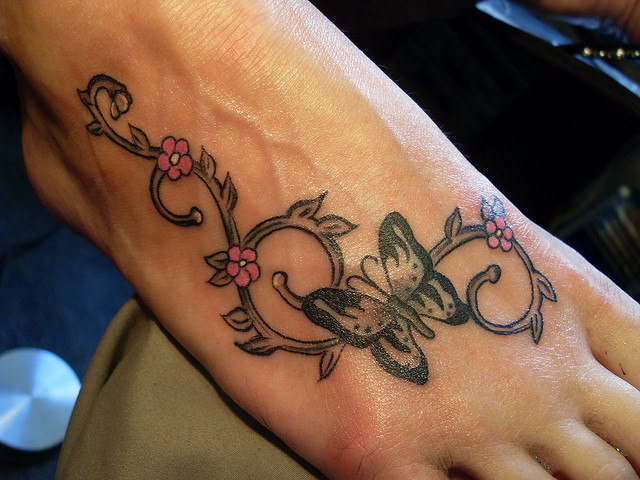 Black And Grey Butterfly Foot Tattoo Idea For Girls