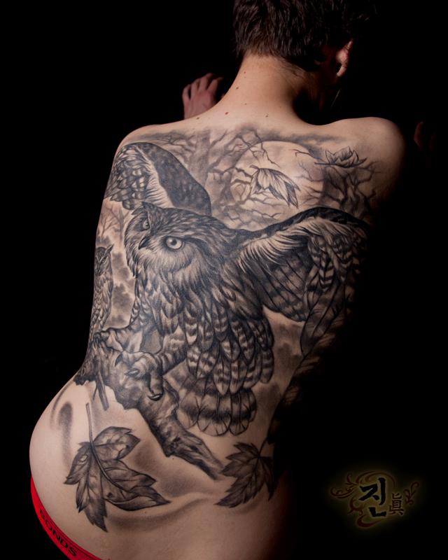 Black And Grey Flying Owl Tattoo On Man Full Back