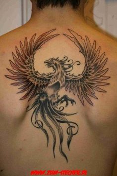 Black And Grey Flying Phoenix Tattoo On Man Upper Back