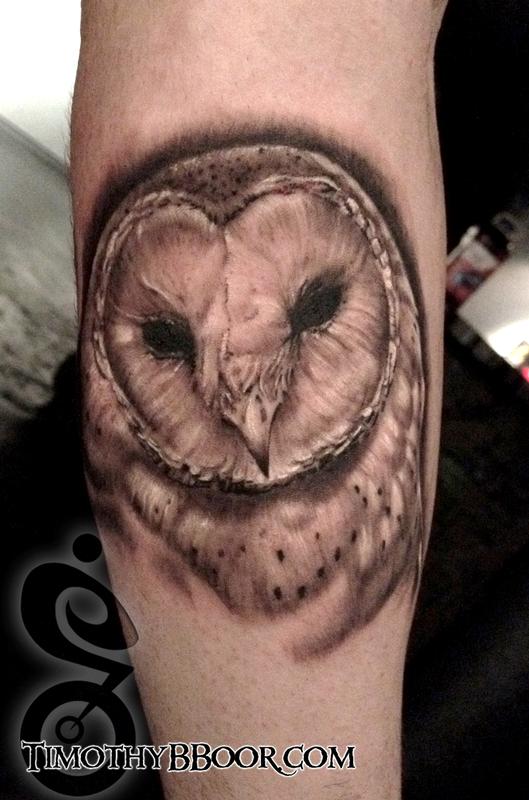Black And Grey Owl Bird Head Tattoo Design For Arm