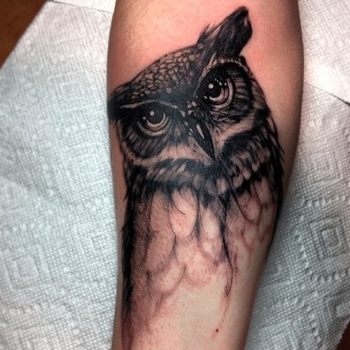 Black And Grey Owl Face Tattoo Design