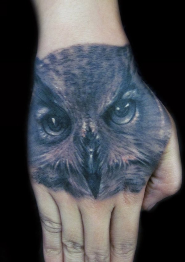 Black And Grey Owl Face Tattoo On Right Hand