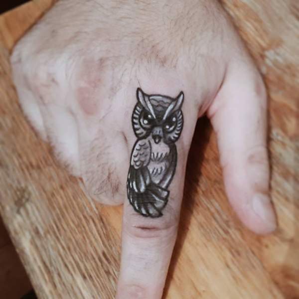 Black And Grey Owl Tattoo On Finger