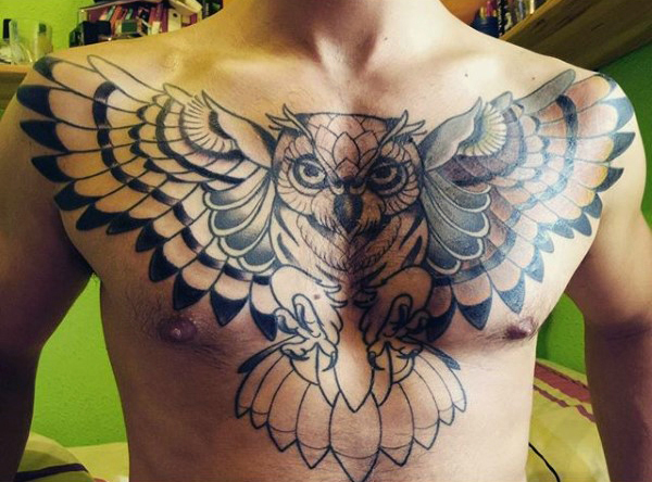 Black And Grey Owl Tattoo On Man Chest