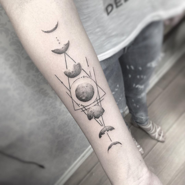 Black And Grey Phases Of The Moon Tattoo On Forearm