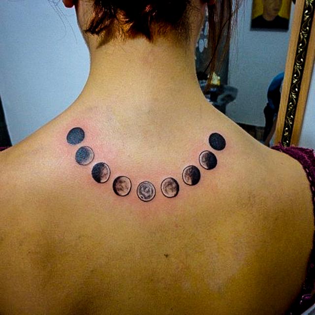 Black And Grey Phases Of The Moon Tattoo On Upper Back