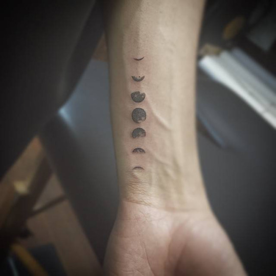 Black And Grey Phases Of The Moon Tattoo On Wrist
