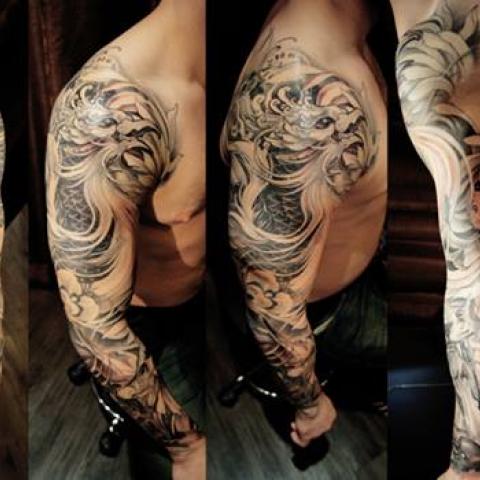 Black And Grey Phoenix Tattoo On Man Right Full Sleeve