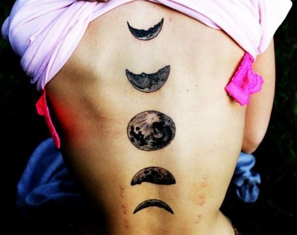 Black And Grey Small Phases Of The Moon Tattoo On Full Back
