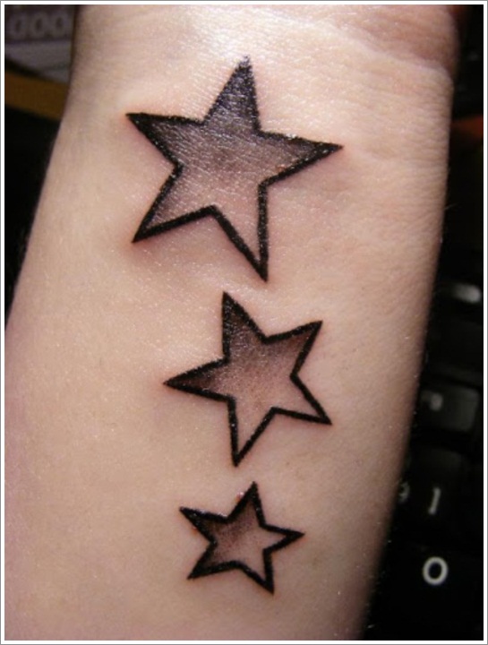 Black And Grey Wrist Star Tattoos