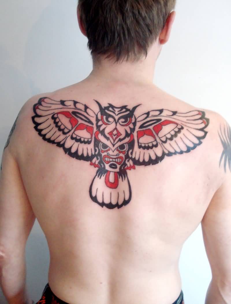 Black And Red Aztec Owl Tattoo On Man Upper Back