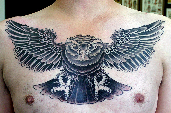 Black And White Flying Owl Tattoo On Man Chest By Adrian Sanchez