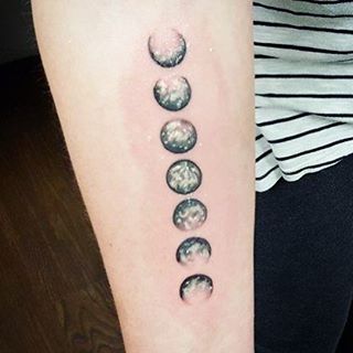 Black And White Phases Of The Moon Tattoo On Right Forearm