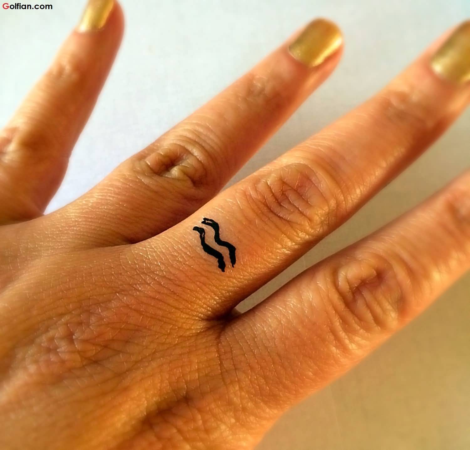 Black Aquarius Zodiac Symbol Tattoo On Left Hand Finger