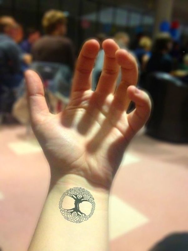 Black Celtic Tree Of Life Tattoo On Left Wrist