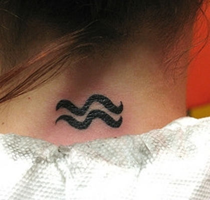 Black Ink Aquarius Zodiac Sign Tattoo On Girl Back Neck