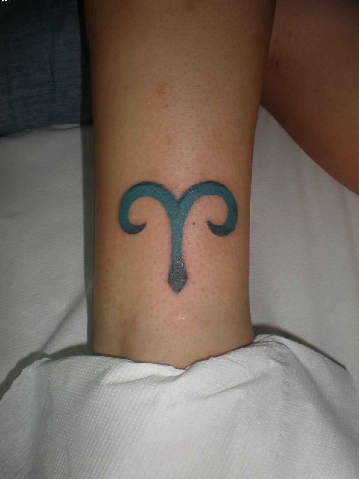 Black Ink Aries Zodiac Sign Tattoo Design For Leg