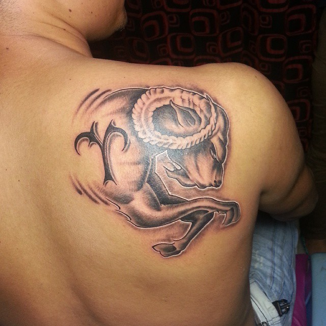 Black Ink Aries Zodiac Sign Tattoo On Man Right Back Shoulder