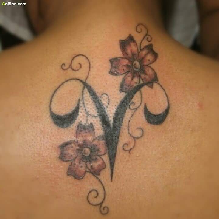 Black Ink Aries Zodiac Sign With Flowers Tattoo On Upper Back
