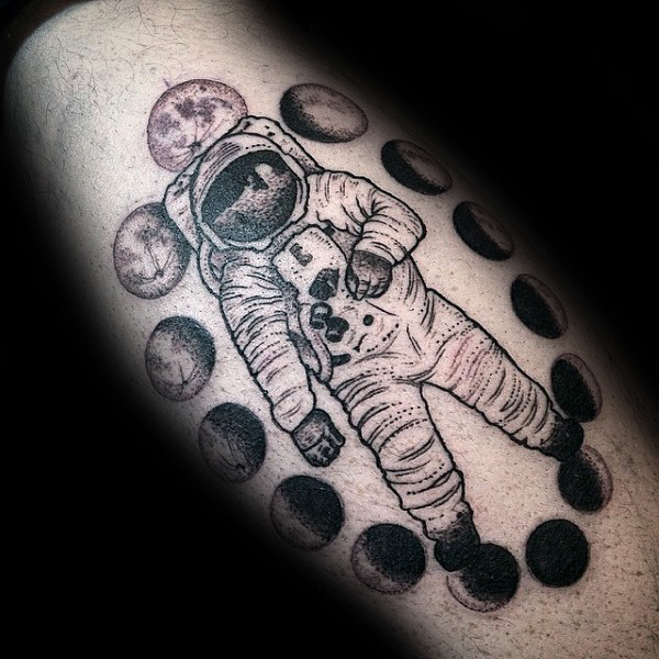 Black Ink Astronaut With Phases Of The Moon Tattoo Design For Leg