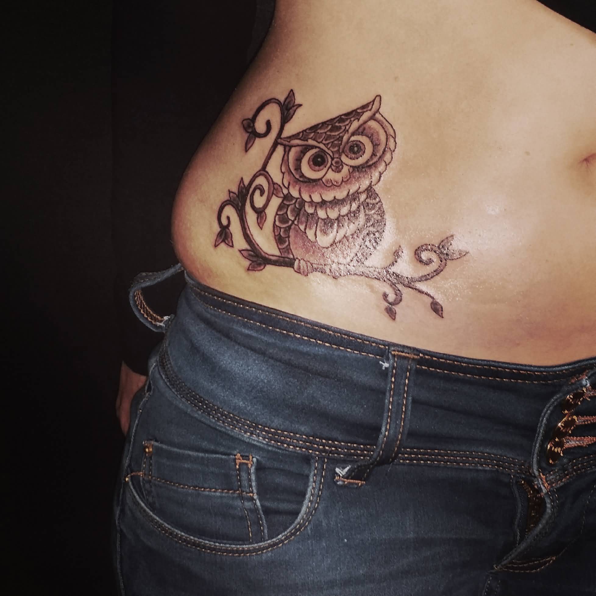 Black Ink Baby Owl On Branch Tattoo On Girl Right Side Rib
