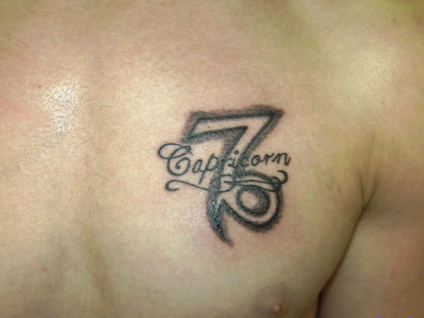 Black Ink Capricorn Zodiac Sign Tattoo On Man Left Chest