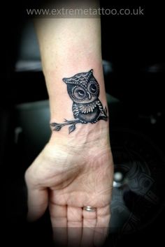 Black Ink Cute Owl On Branch Tattoo On Right Wrist