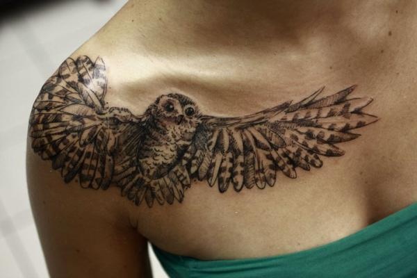 Black Ink Flying Owl Bird Tattoo On Right Front Shoulder