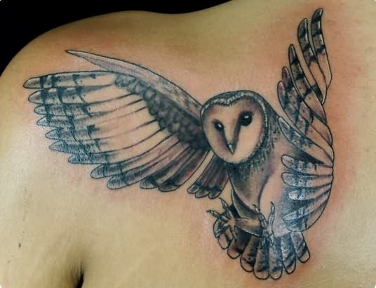 Black Ink Flying Owl Tattoo On Left Back Shoulder