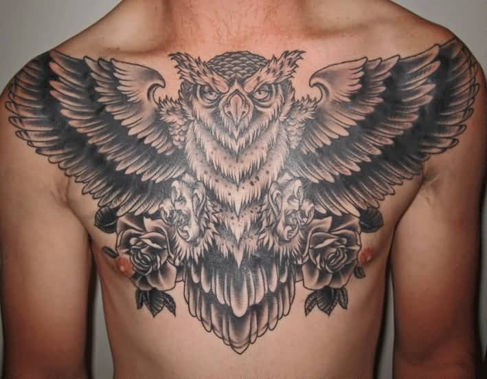 Black Ink Flying Owl With Roses Tattoo On Man Chest