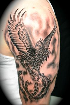 Black Ink Flying Phoenix Tattoo On Left Upper Arm