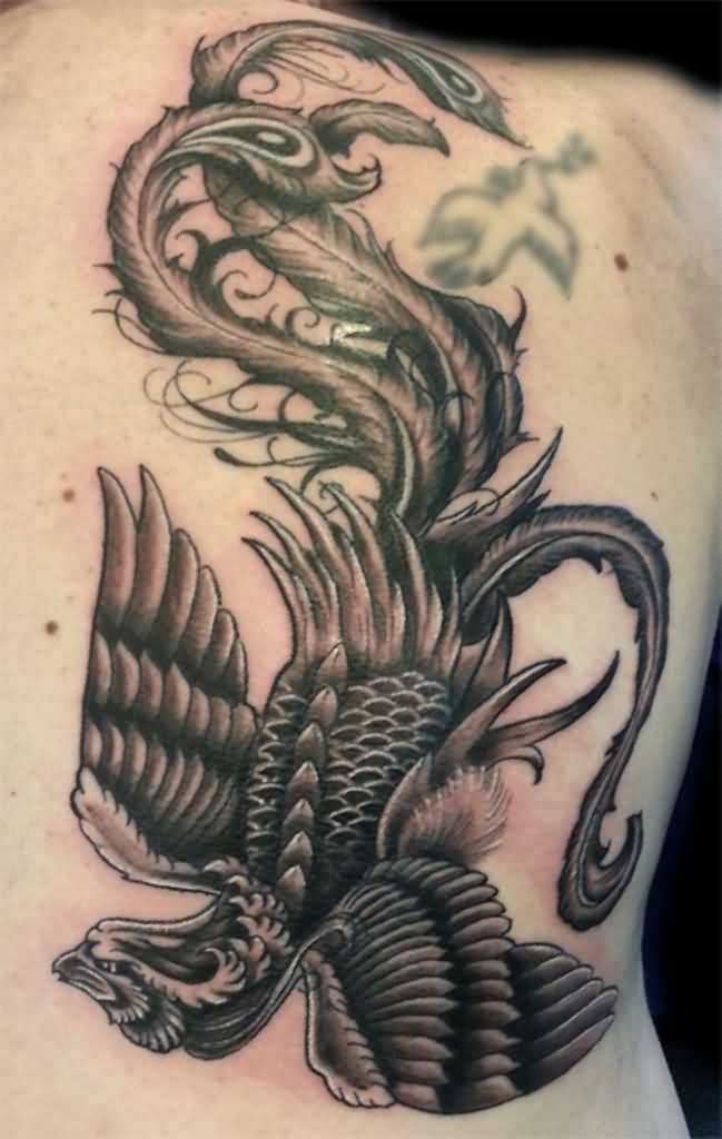 Black Ink Flying Phoenix Tattoo On Right Back Shoulder By Lauren Birchfield