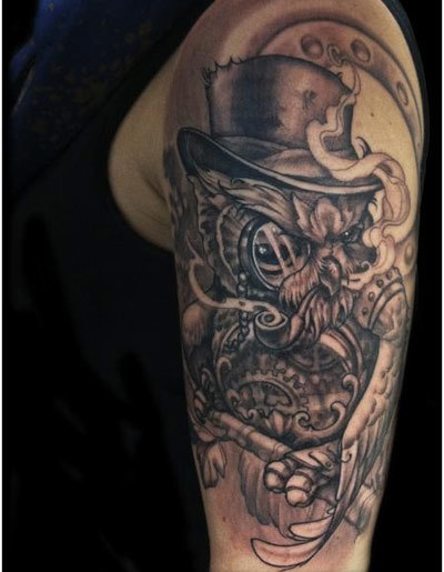 Black Ink Gentleman Owl Tattoo On Left Half Sleeve