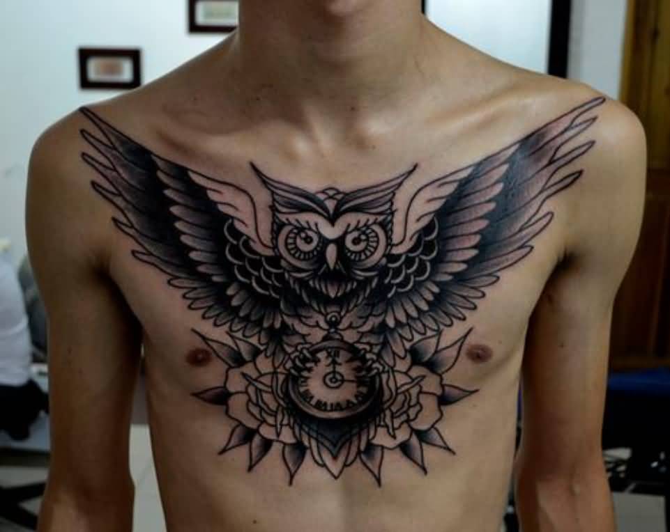 Black Ink Owl Bird With Pocket Watch And Roses Tattoo On Man Chest