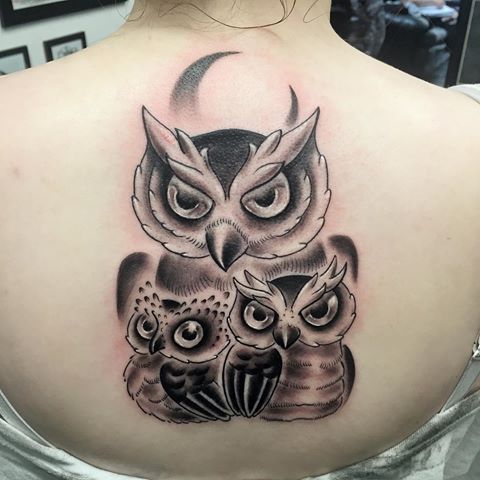 Black Ink Owl Family Tattoo On Girl Upper Back