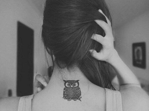 Black Ink Owl Tattoo On Girl Back Neck