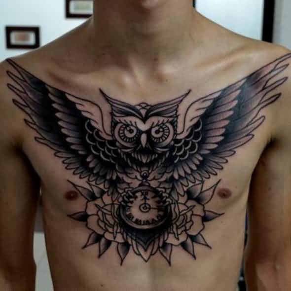Black Ink Owl With Flower Tattoo On Man Chest
