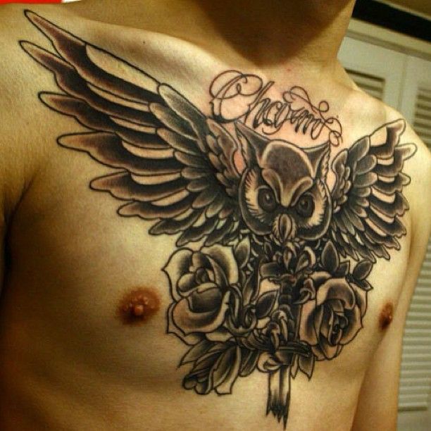 Black Ink Owl With Roses Tattoo On Man Chest